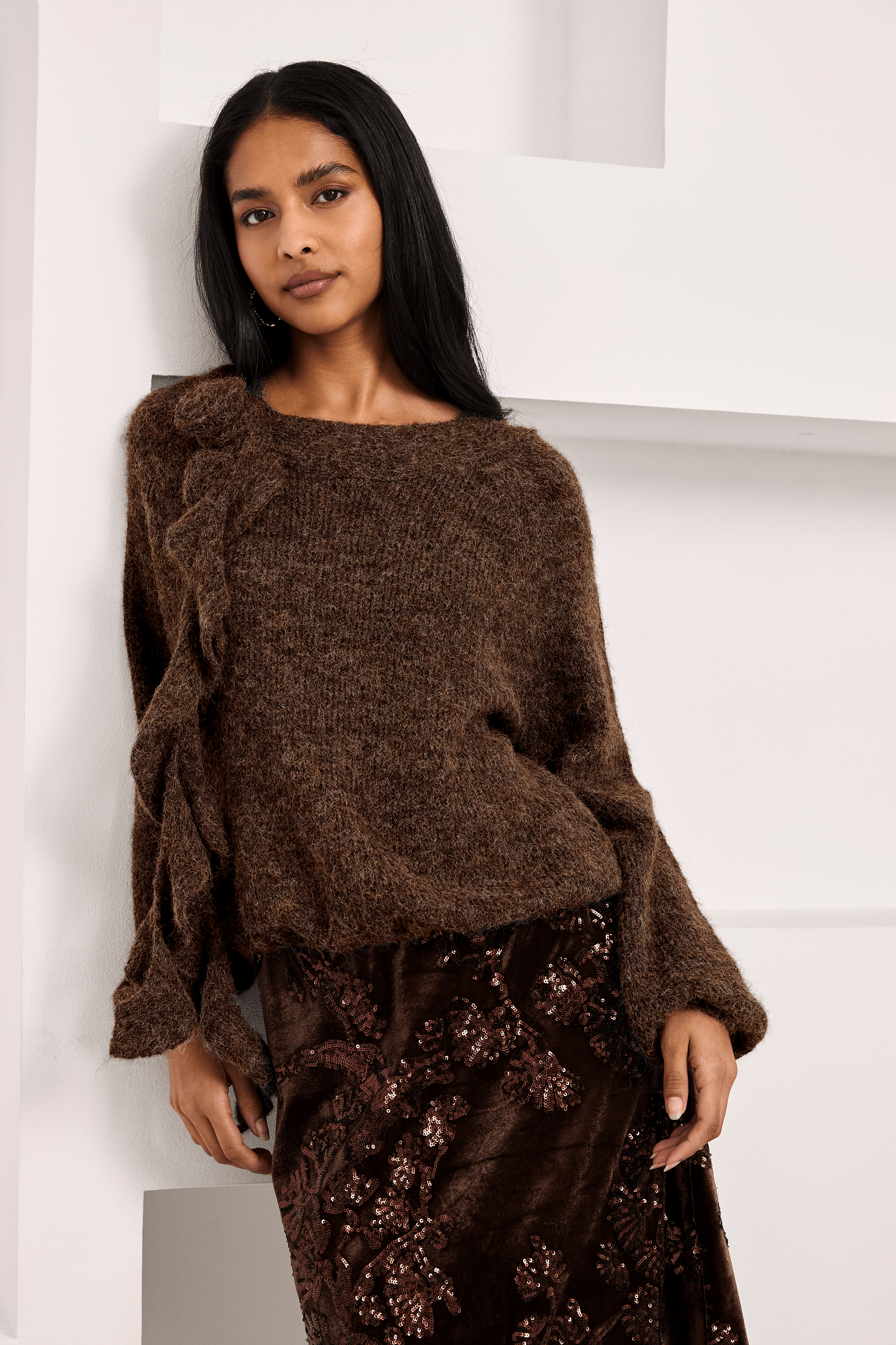 NEKANE · Jersey con flor y volantes